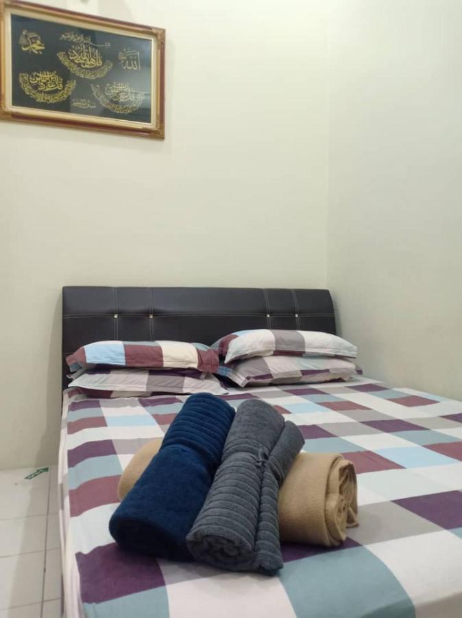 Kh Homestay Comfy N Calm เซอรีมันจุง ภายนอก รูปภาพ